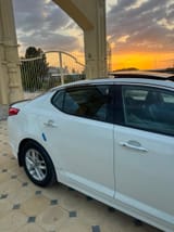Kia K5 2011 — фото 2 из 9